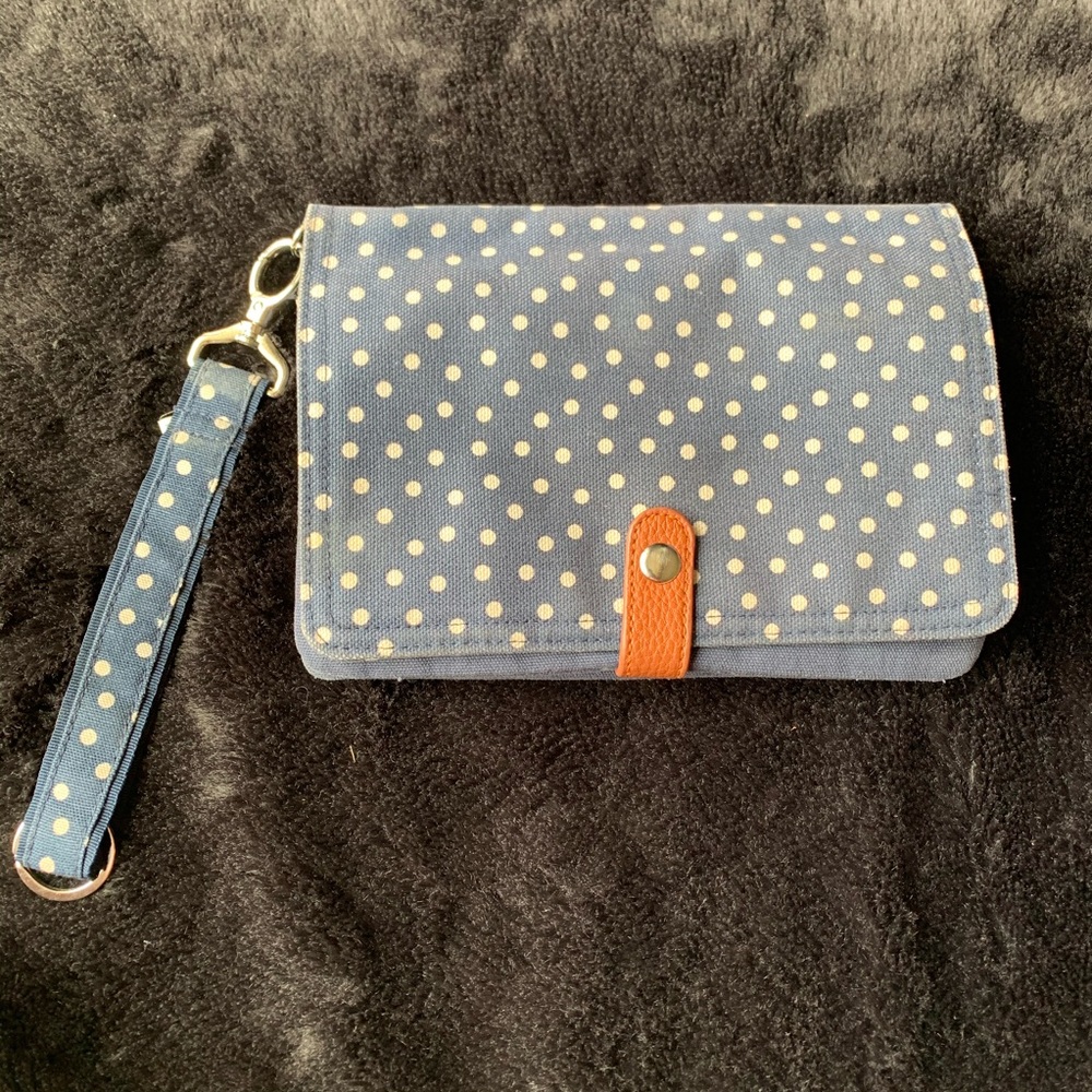 Navy and white polka dot clutch